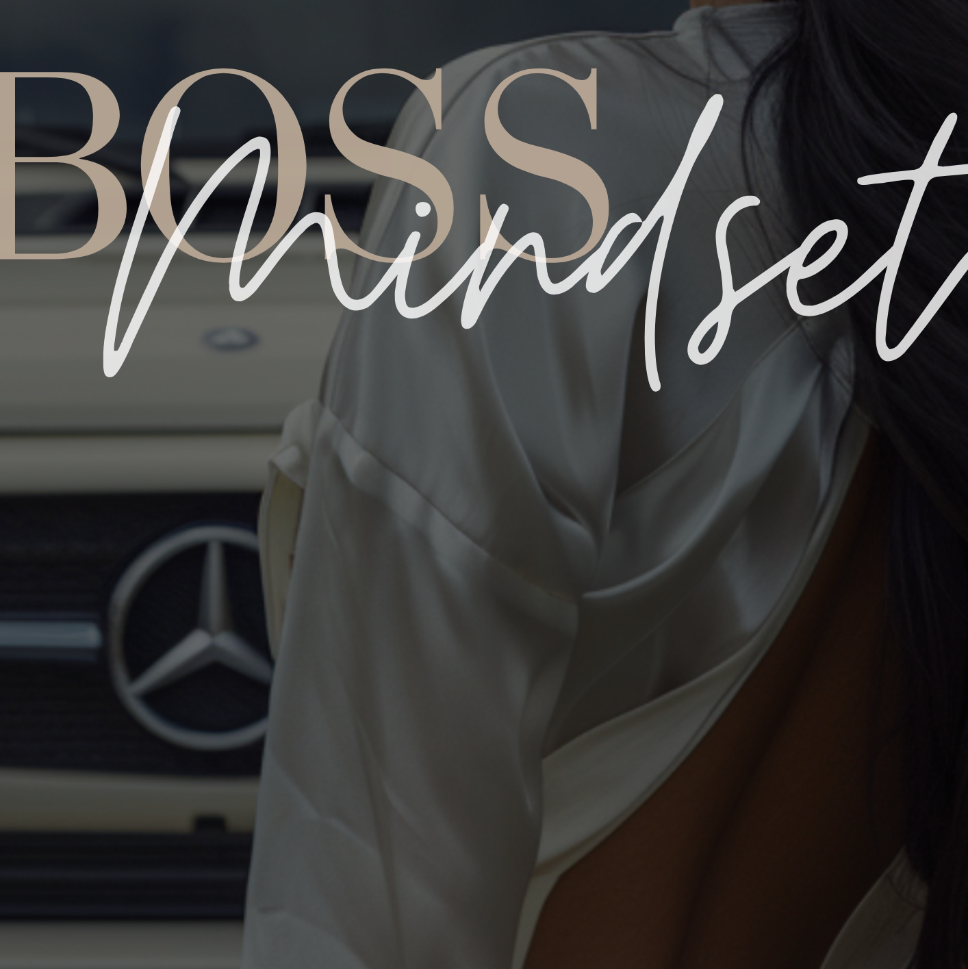 Person wearing a white shirt with 'BOSS Mindset' text and Mercedes-Benz logo.
